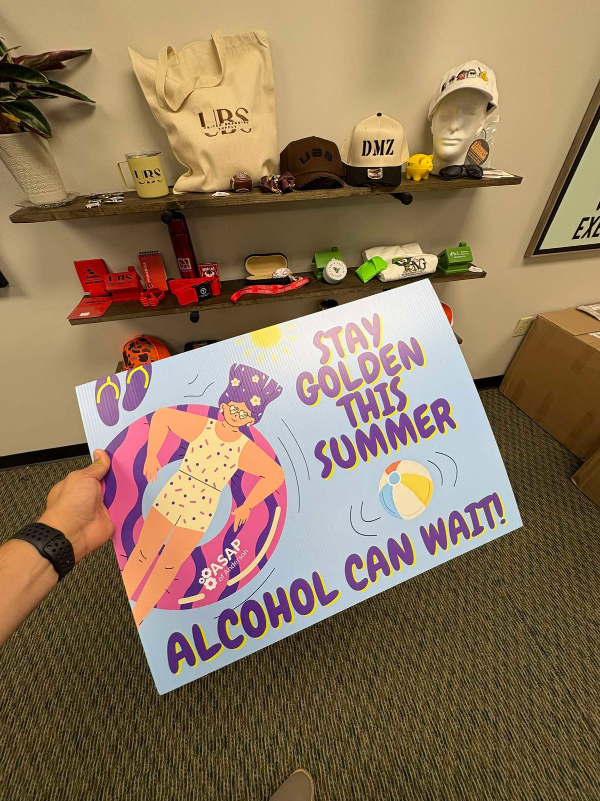 Small custom printed "Stay Golden This Summer, Alcohol Can Wait" sign for ASAP of Anderson, by United Branding Supply