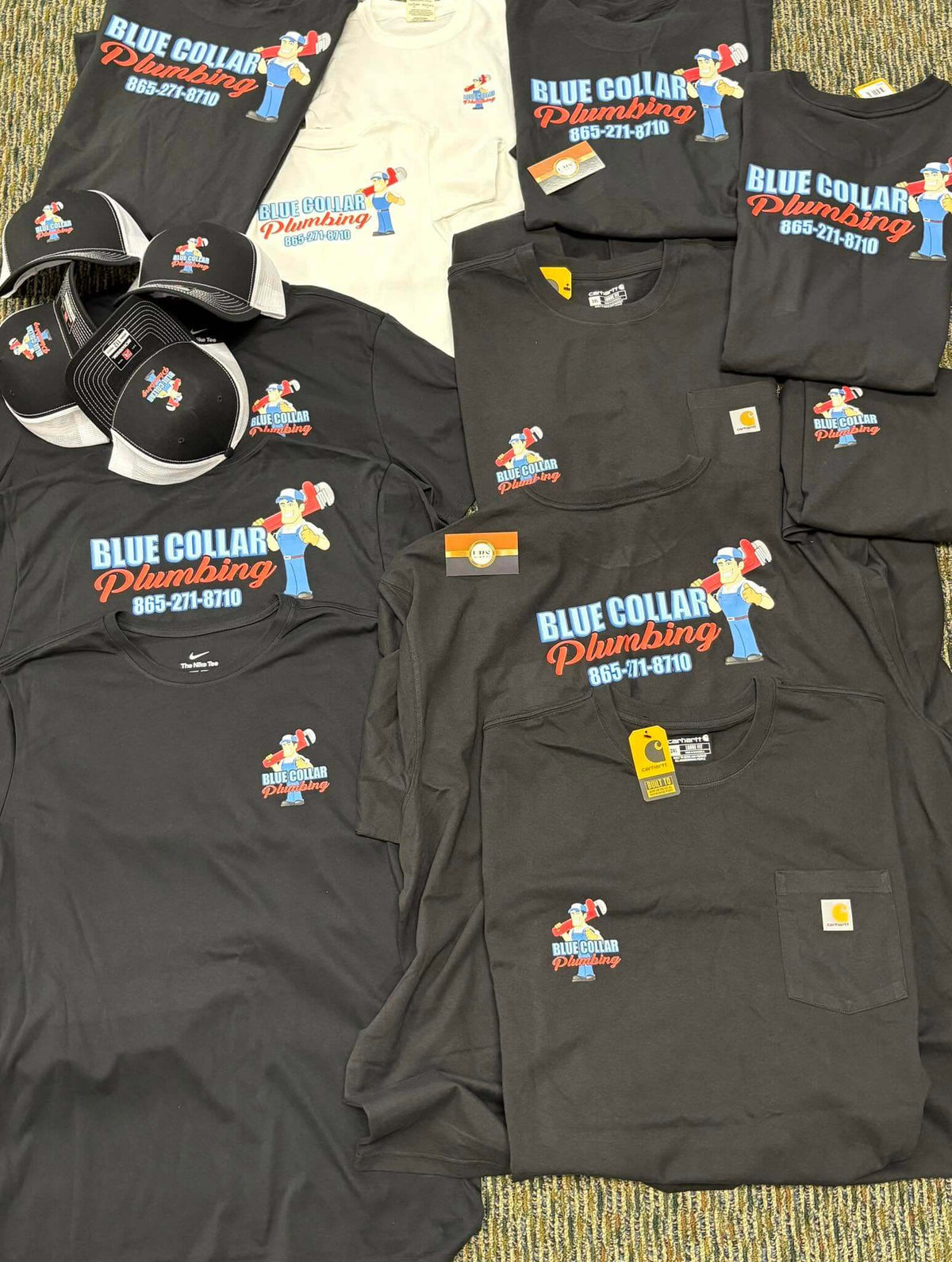 Blue Collar Plumbing branded t-shirts and trucker hats with mascot logo and phone number, by United Branding Supply.