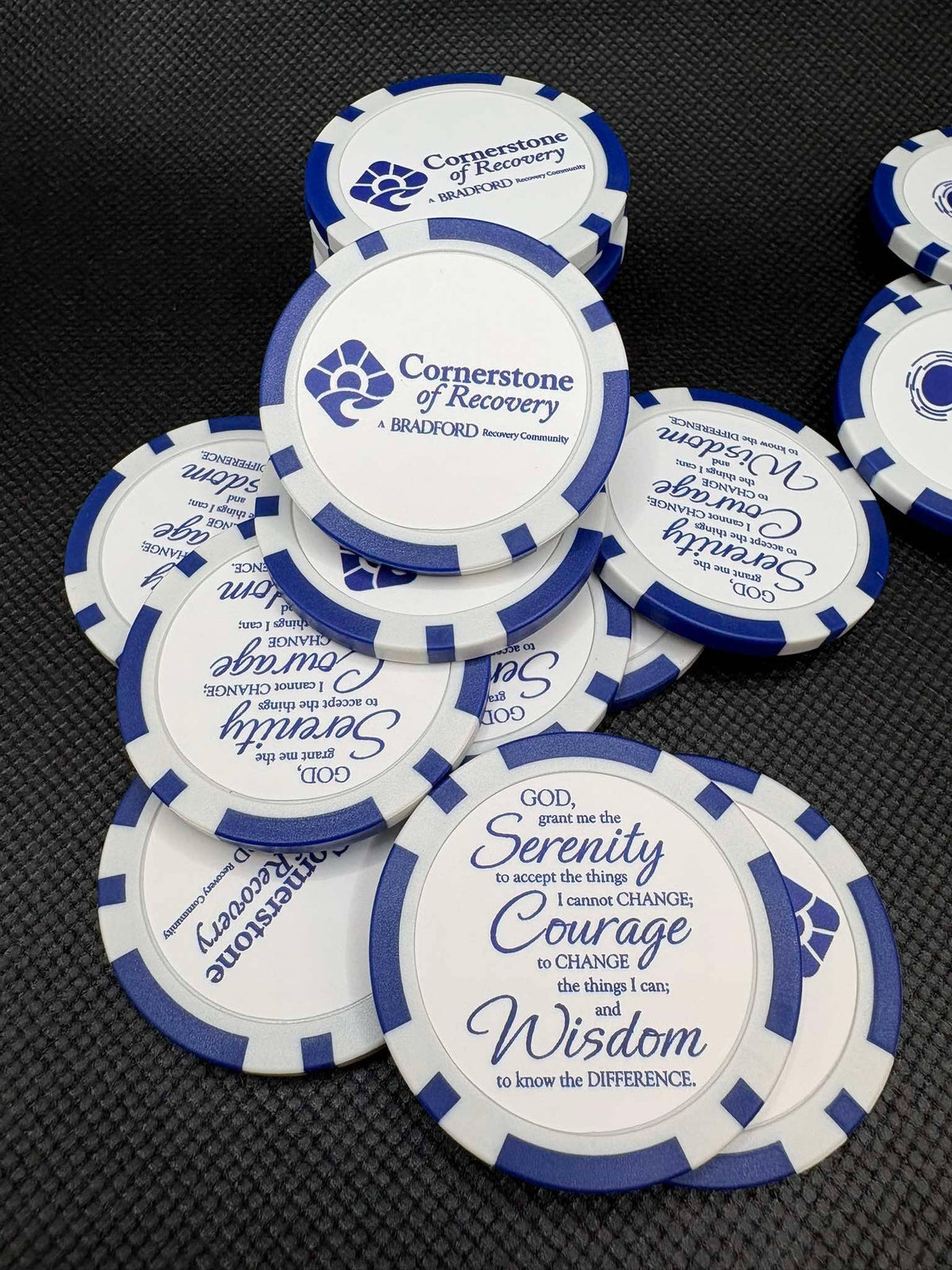 Custom poker chips for Cornerstone of Recovery, a Bradford Recovery Community, featuring the Serenity Prayer, by United Branding Supply